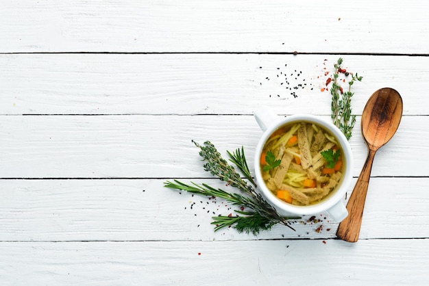 Bowl of homemade soup with herbs